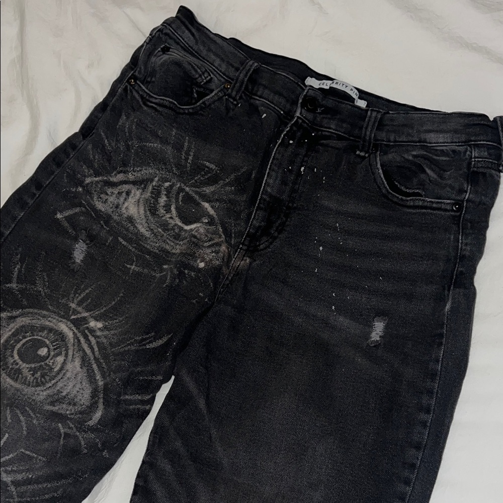 Black Jeans with Subtle Graphic Eye Detailing